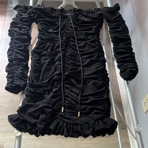 Long sleeve off the shoulder black mini dress